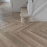 Greige Oak Herringbone Laminate Flooring