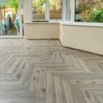 Fusion 12mm Volcanic Grey Oak Herringbone Laminate Flooring