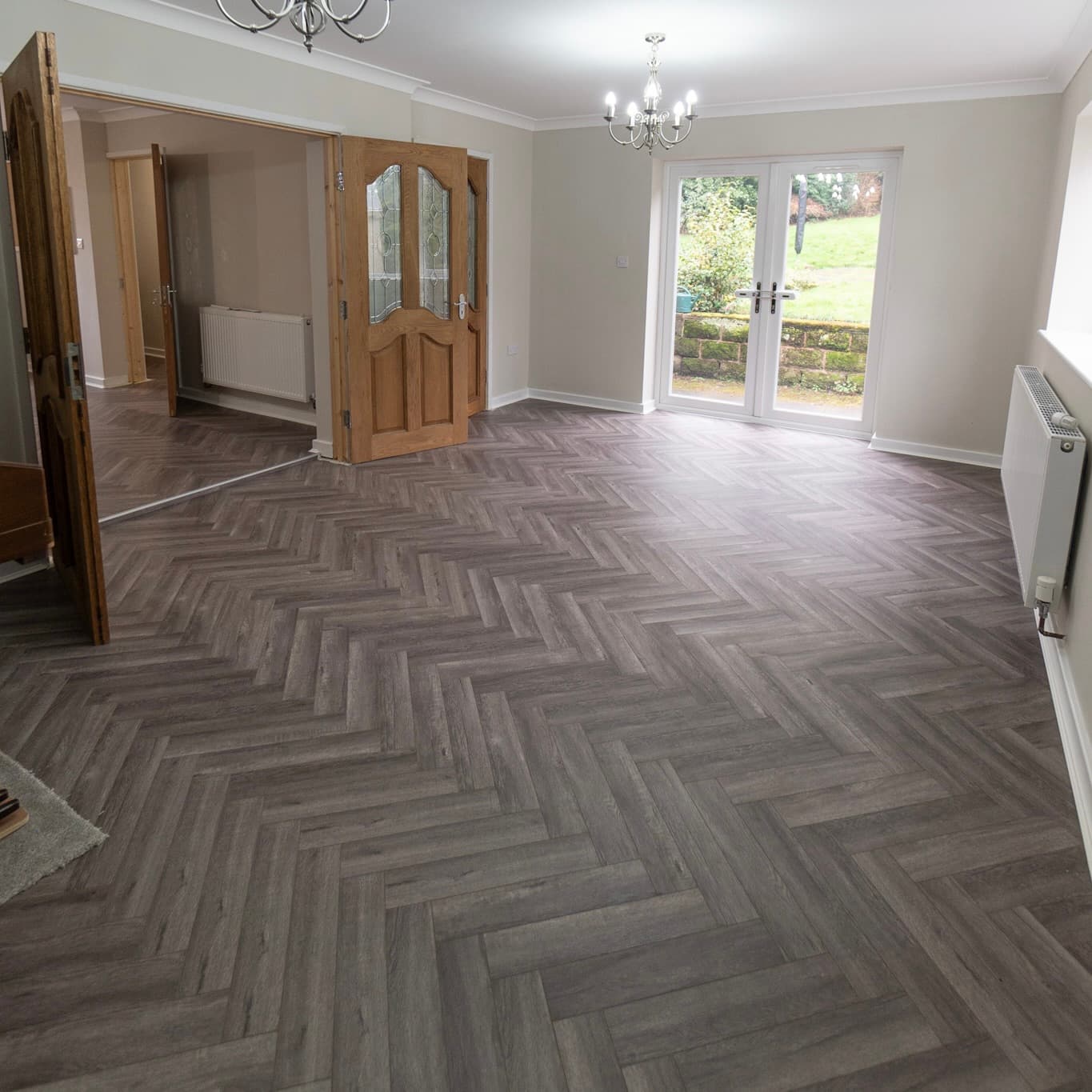 Craft 12mm Cosmic Grey Oak Herringbone AC5 Laminate Flooring
