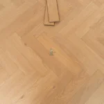 Craft 12mm Sunset Oak Herringbone AC5 Laminate Flooring