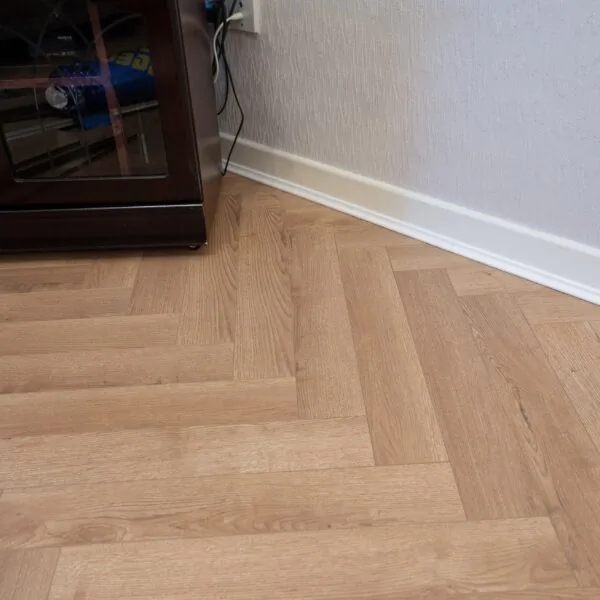 Flair 12mm Biscoff Oak Herringbone Laminate Flooring