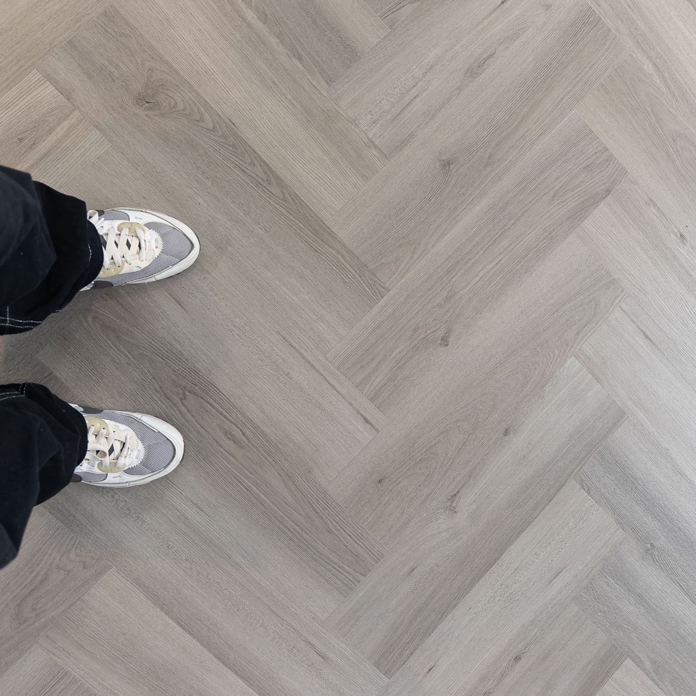 Imperial Grey Luxury Vinyl Click Flooring with a sleek grey wood-grain finish.