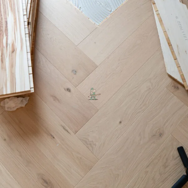 Riviera Prime Click 14/3 x 150mm Pale Invisible Oak Herringbone Engineered Wood Flooring