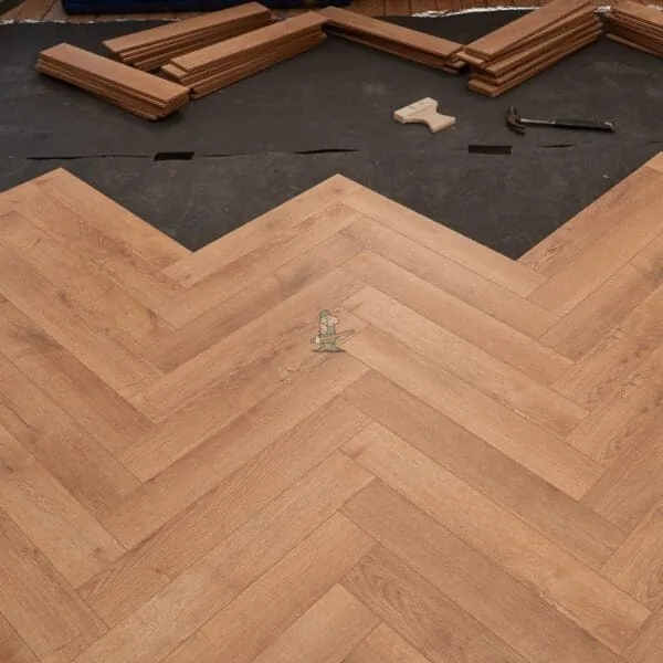Flair 12mm Biscoff Oak Herringbone Laminate Flooring