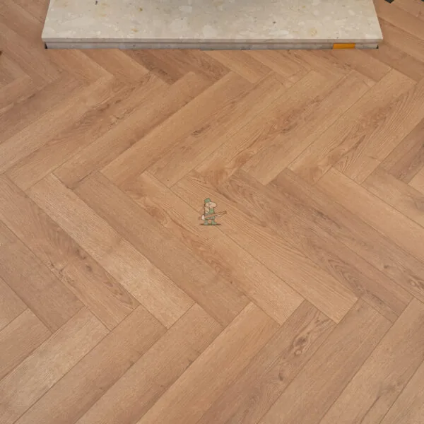 Flair 12mm Biscoff Oak Herringbone Laminate Flooring