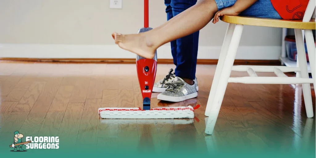 Cleaning an easy-to-clean wood floor in a busy home using a flat mop
