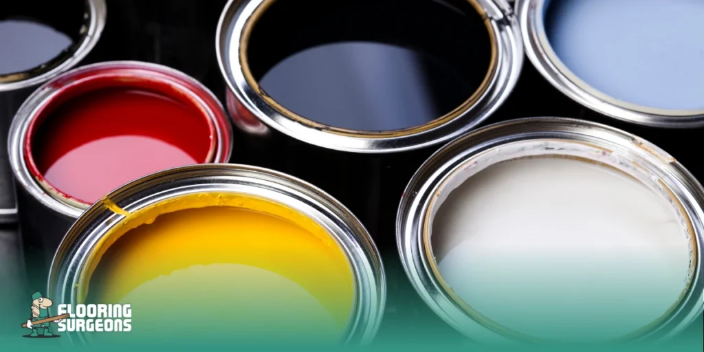 Why Is Farrow and Ball Paint So Expensive Open tins of richly pigmented paint showing deep, saturated colours similar to Farrow & Ball high pigment formulas