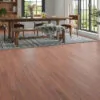 Close-up of chestnut brown oak laminate flooring with natural wood grain texture