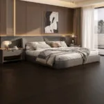 Elegant modern bedroom featuring Nevada 14/3 x 190mm dark lacquered oak engineered wood flooring, showcasing deep rich brown tones, smooth finish, and contemporary luxury interior design