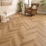 Madrid Oak Herringbone Glue Down LVT Flooring in modern living room
