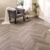 Aragon Oak Herringbone Glue Down LVT Flooring in modern living room