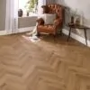 Granada Oak Herringbone Glue Down LVT Flooring in modern living room