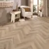 Marbella Oak Herringbone Glue Down LVT Flooring in modren living room