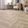 Toledo Oak Herringbone Glue Down LVT Flooring in modern living room