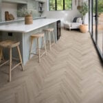 Flair 12mm Malted Grey Oak Herringbone Laminate Flooring kitchen