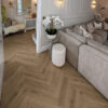Flair 12mm Toasted Oak Herringbone Laminate Flooring living room
